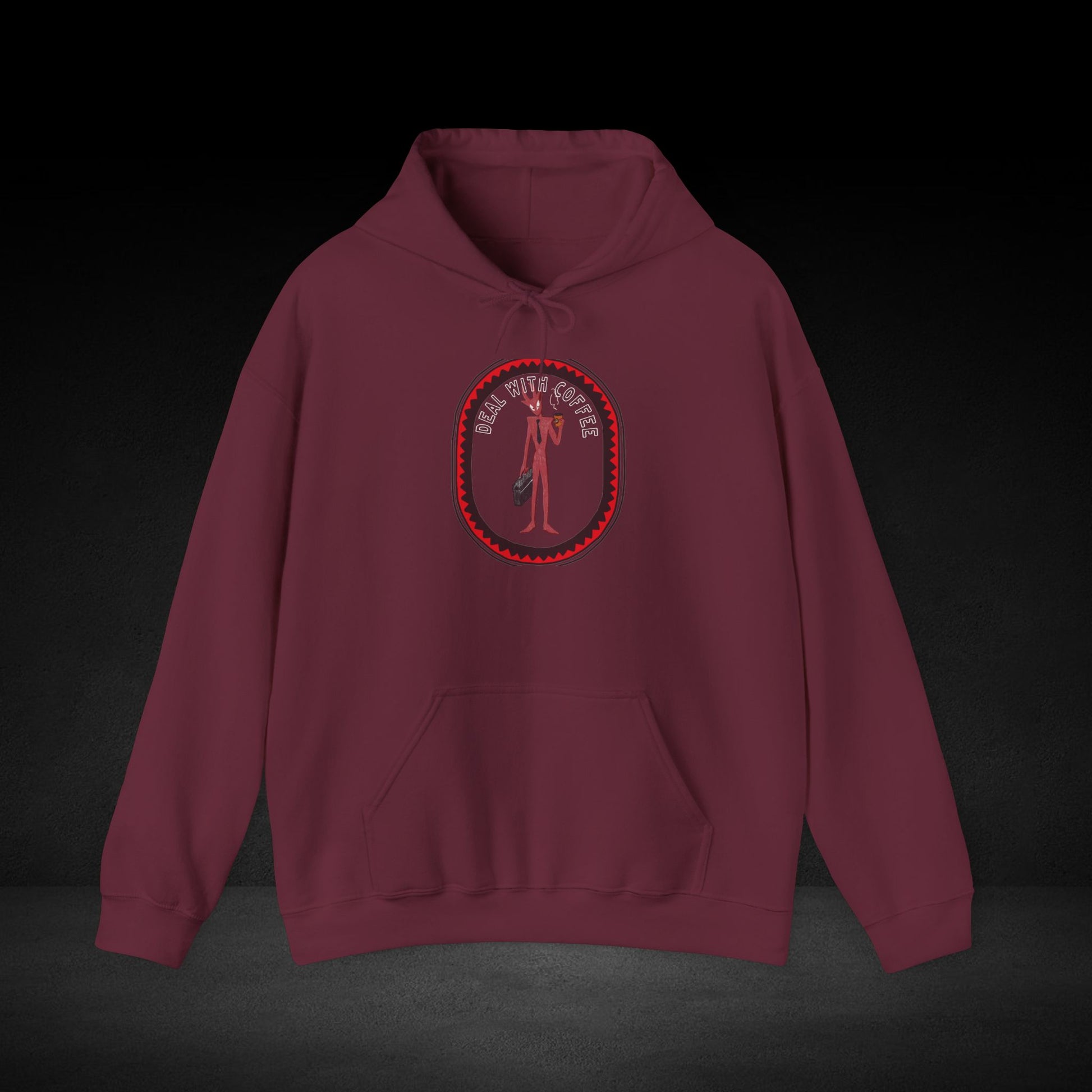 A burgundy hoodie with a graphic design on the front.