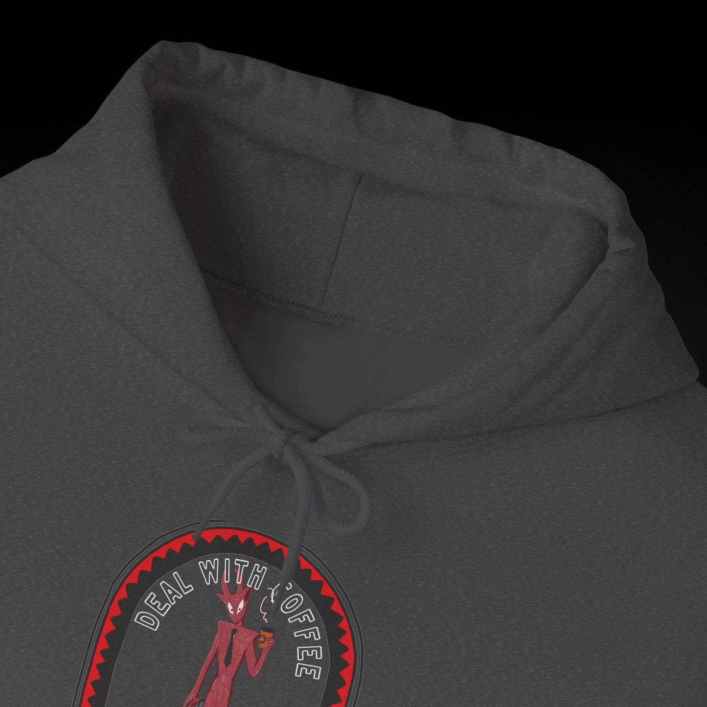 A gray hoodie with a graphic design on the front, featuring a character and the text " Deal with coffee".